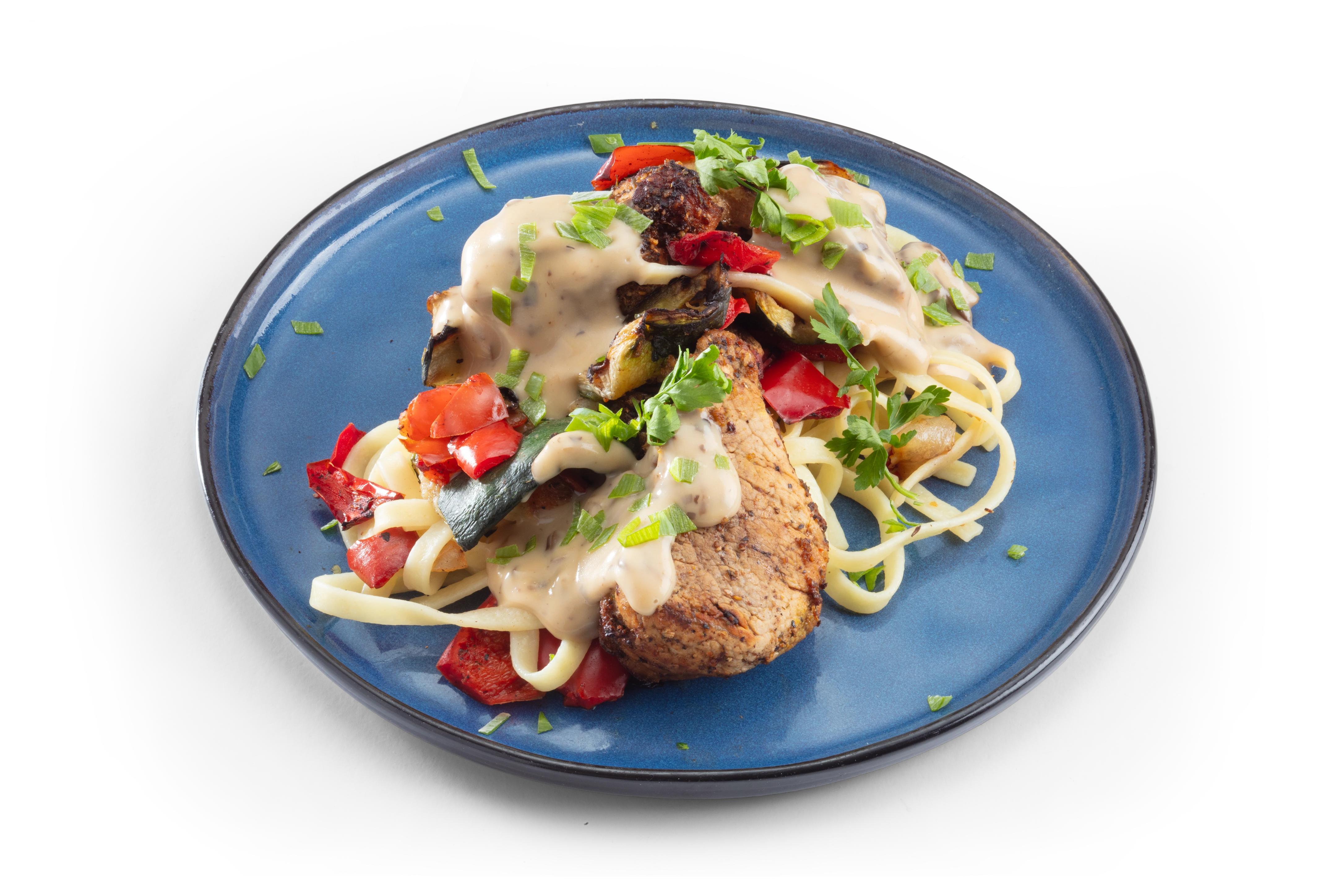 Tagliatelle met gegrilde groenten en varkenshaas medaillons